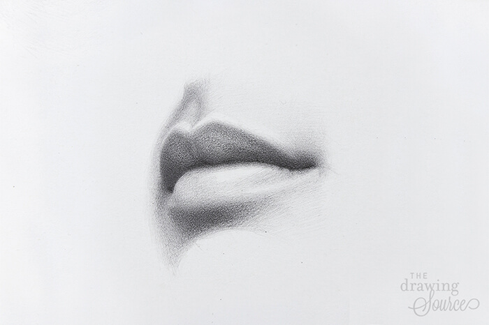 Drawing a more defined line where the lips meet