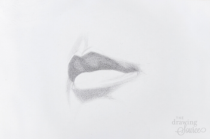 Starting to add values to the lip drawing